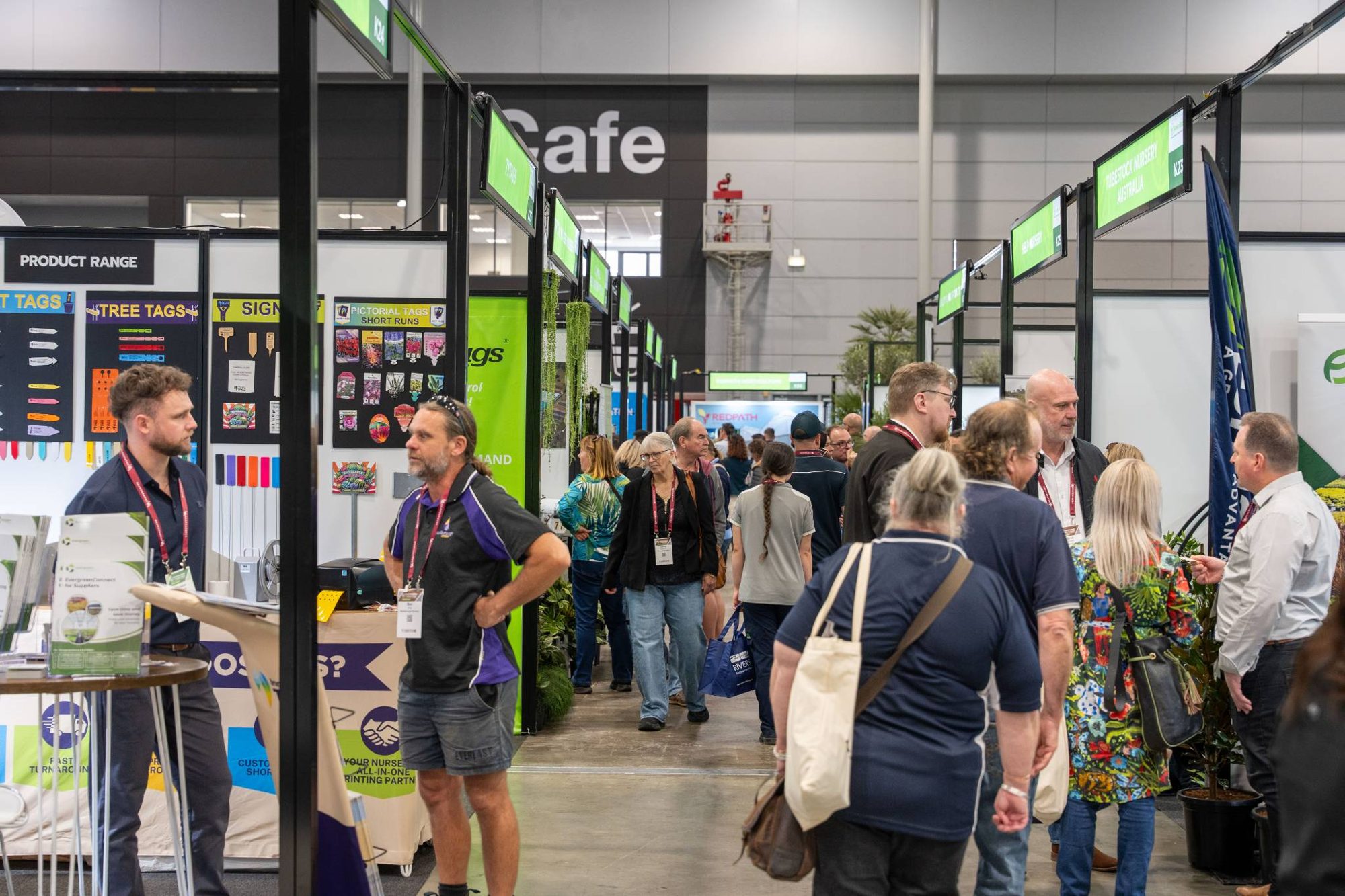 Busy aisle of nursery and supplier stands