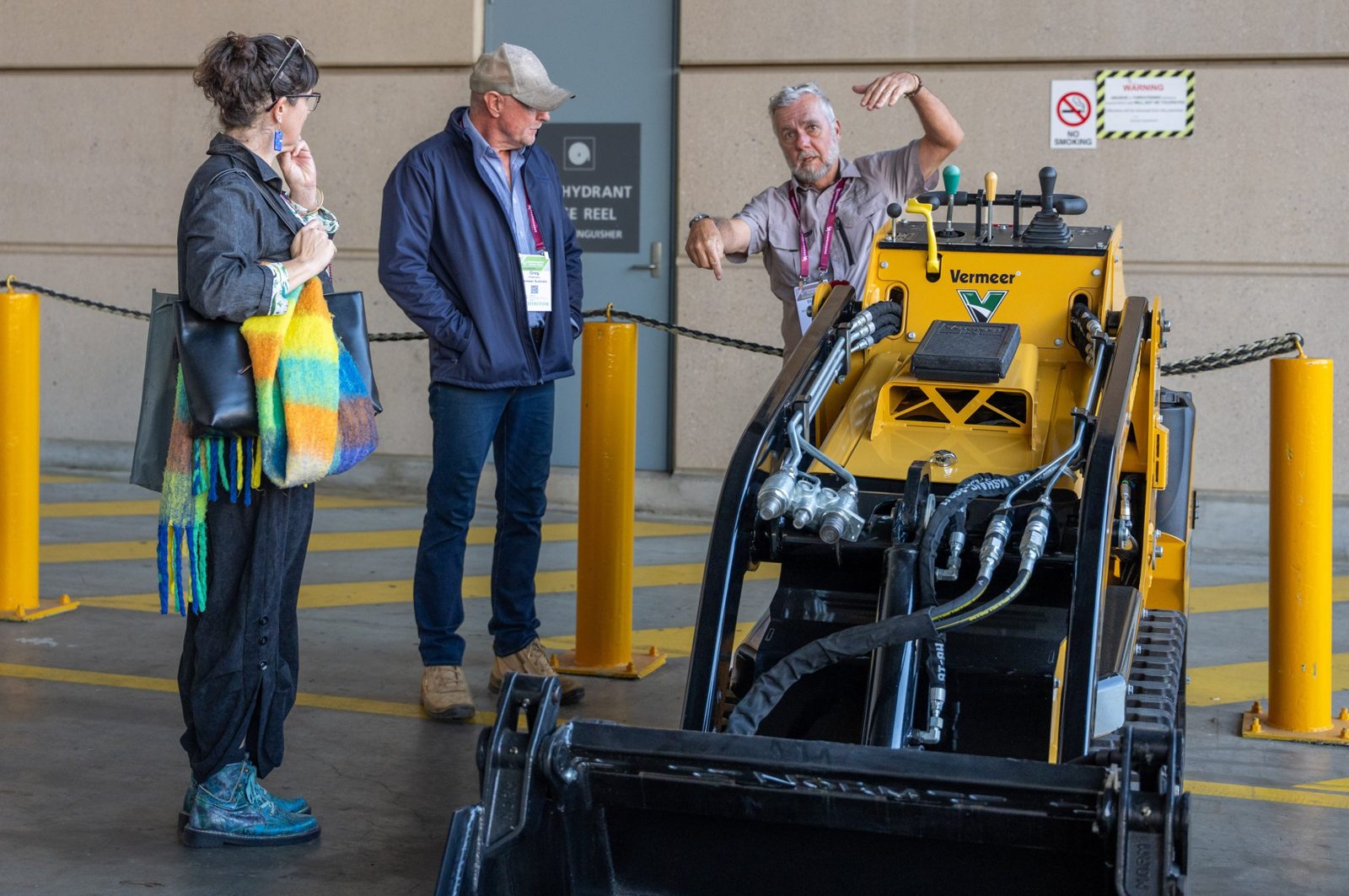 Exhibitor demonstrating a Vermeer mini loader